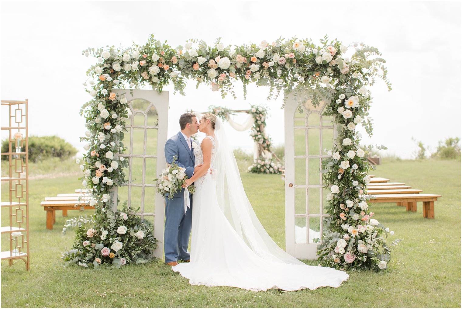 floral arch by Faye and Renee for Sandy Hook Chapel wedding ceremony photographed by Idalia Photography