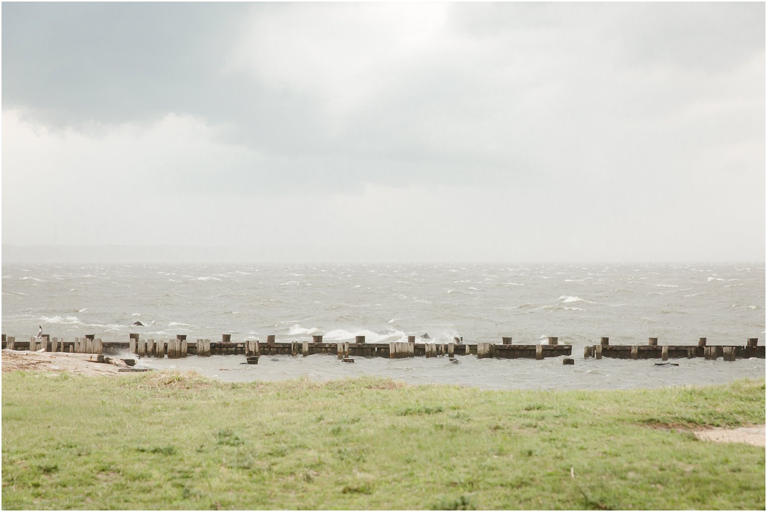 waterfront wedding ceremony at Sandy Hook Chapel with New Jersey wedding photographer Idalia Photography