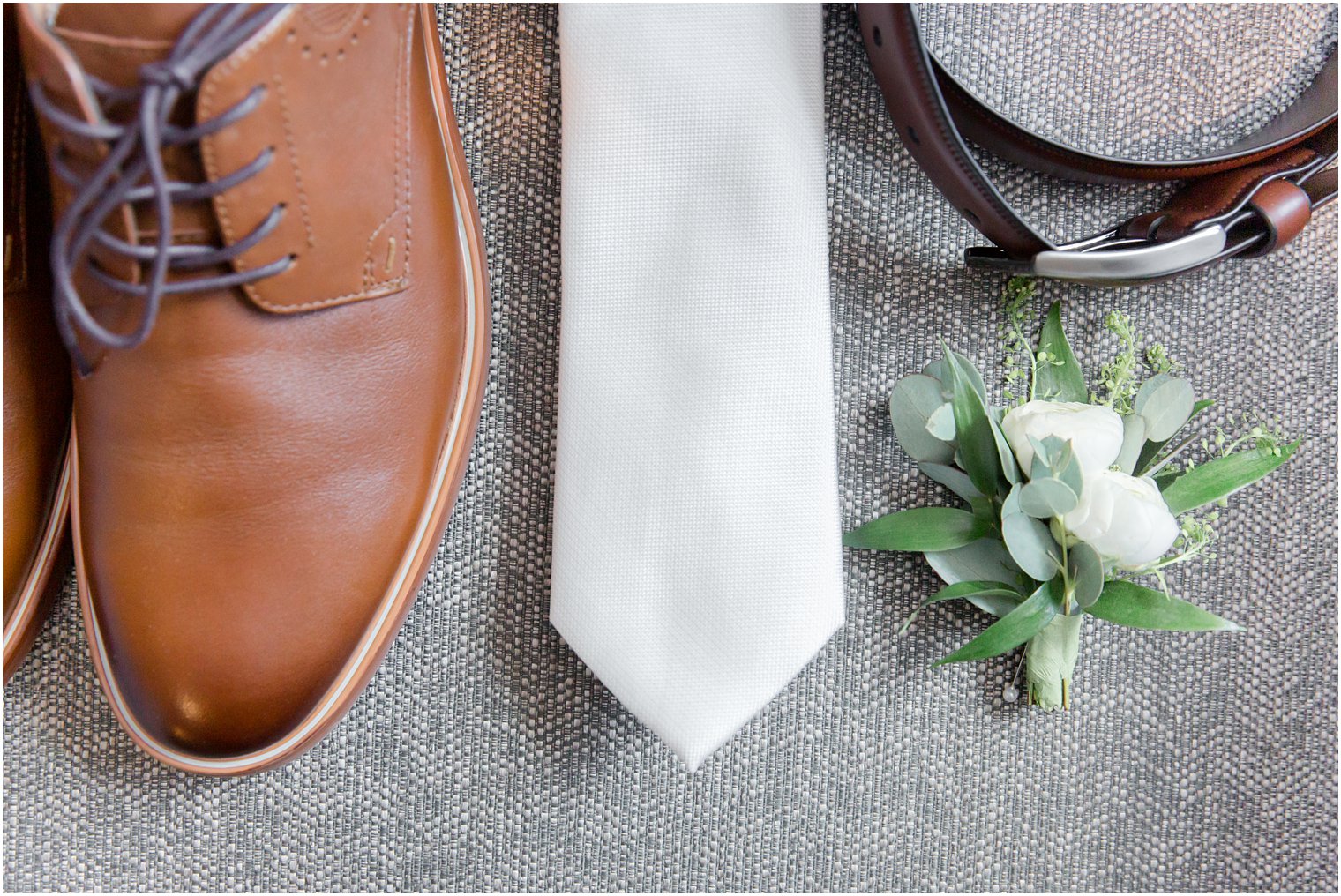 Groom's shoes, tie, and boutonniere | Stone House at Stirling Ridge Wedding Photography by Idalia Photography