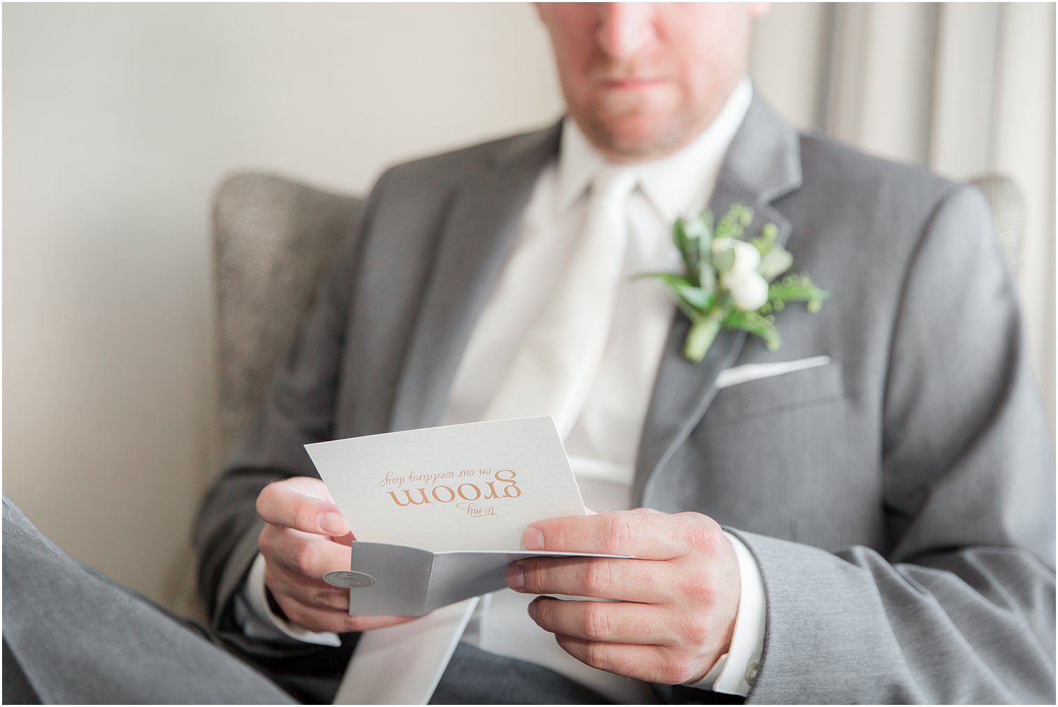 Groom reading letter from bride | Stone House at Stirling Ridge Wedding Photography by Idalia Photography