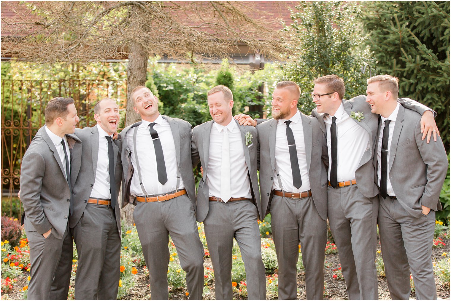 Candid groomsmen photo at Stone House at Stirling Ridge in Warren, NJ