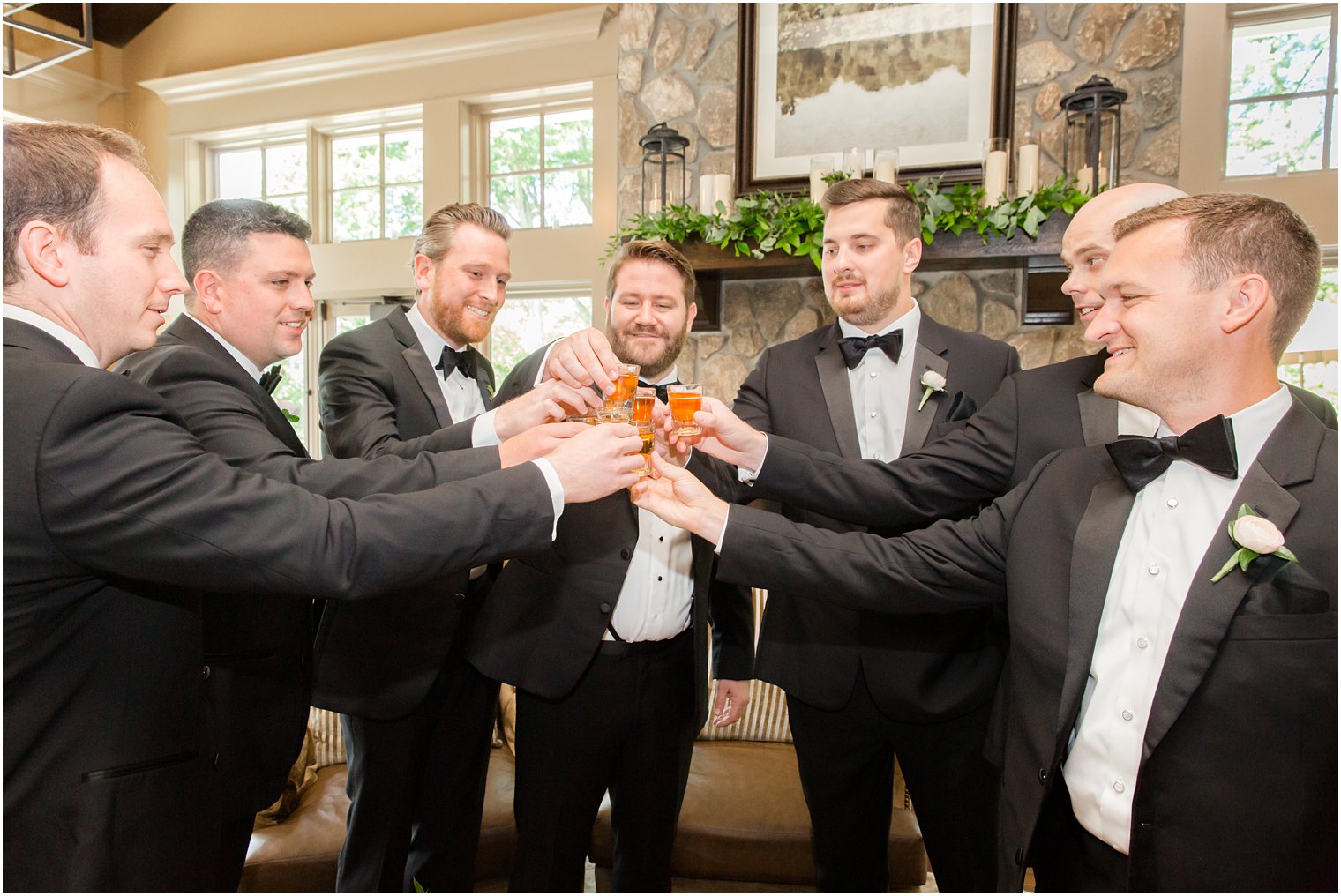 Groom toasting with groomsmen at Indian Trail Club 