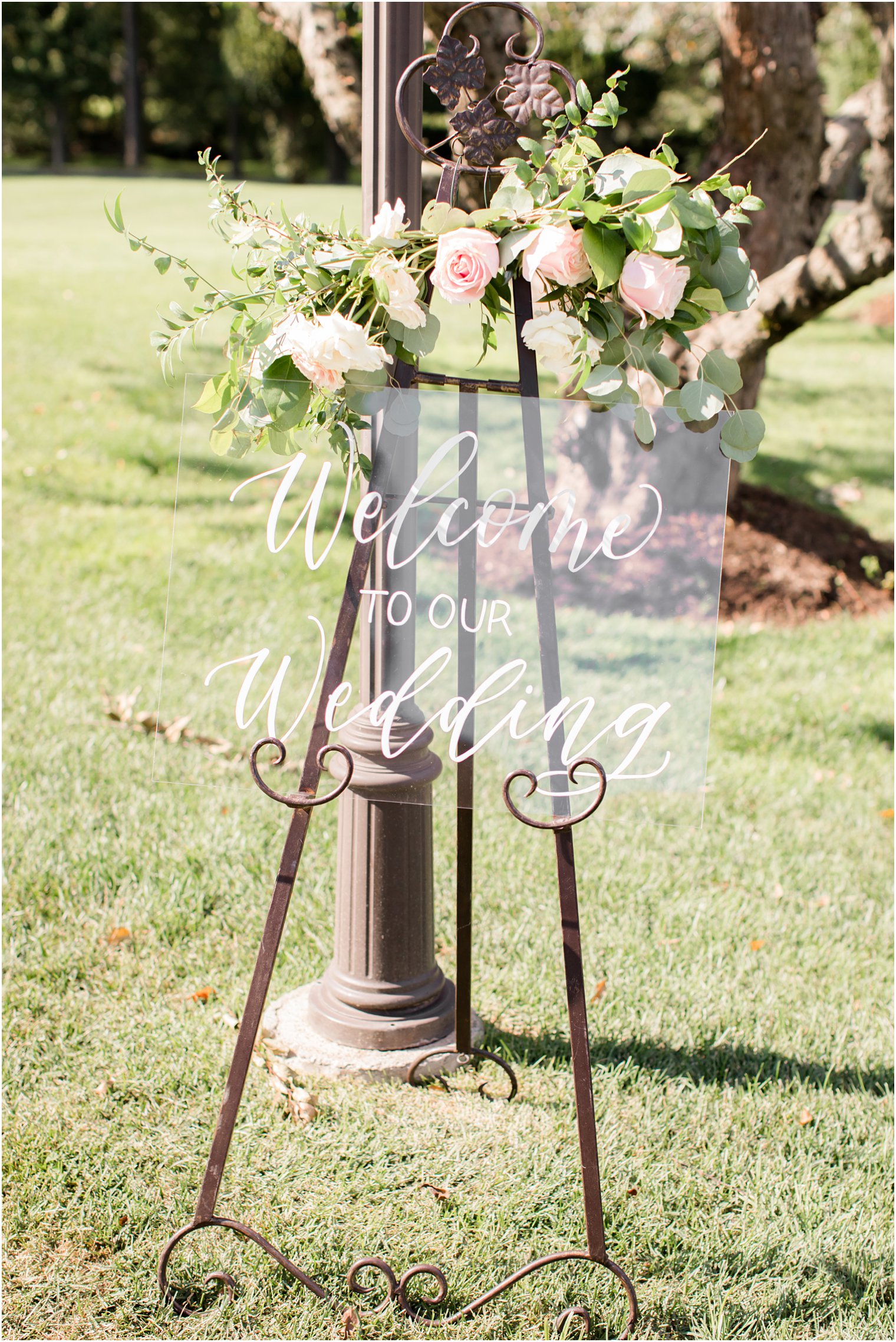 Acrylic welcome sign by The Shaded Maple at the entrance to Indian Trail Club