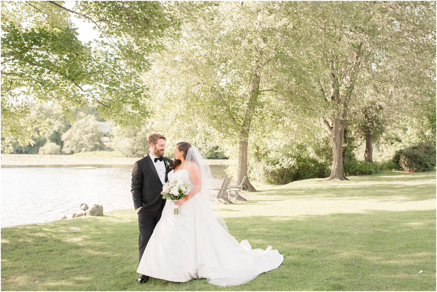 Bride and groom portraits on the grounds of Indian Trail Club 