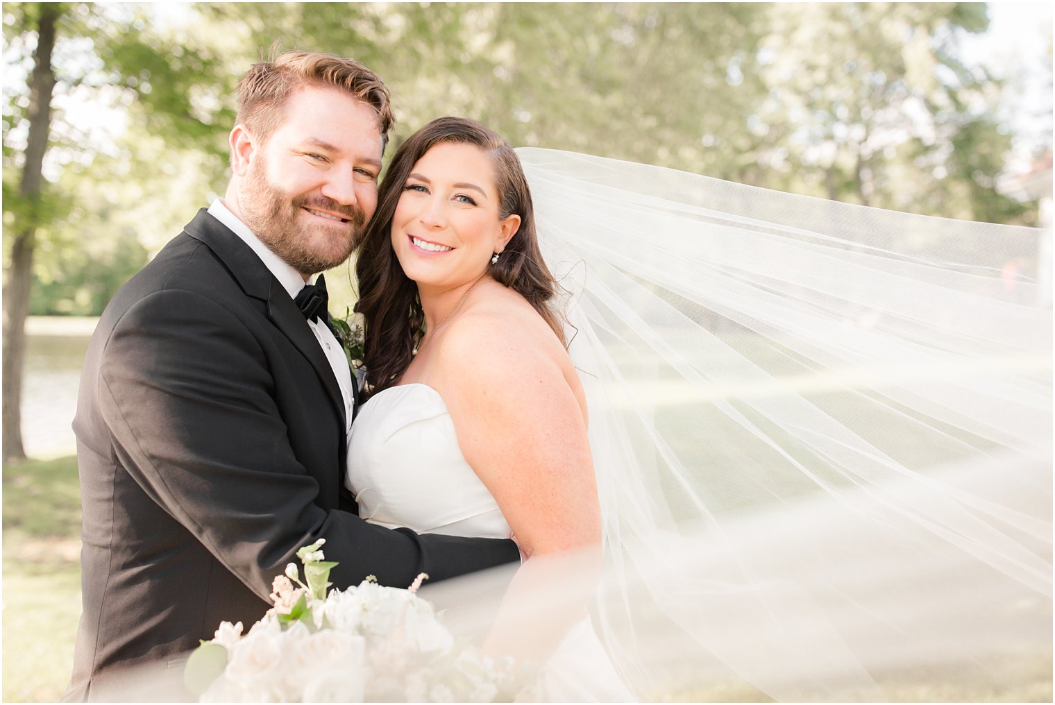 Wedding photos with veil flowing in the wind