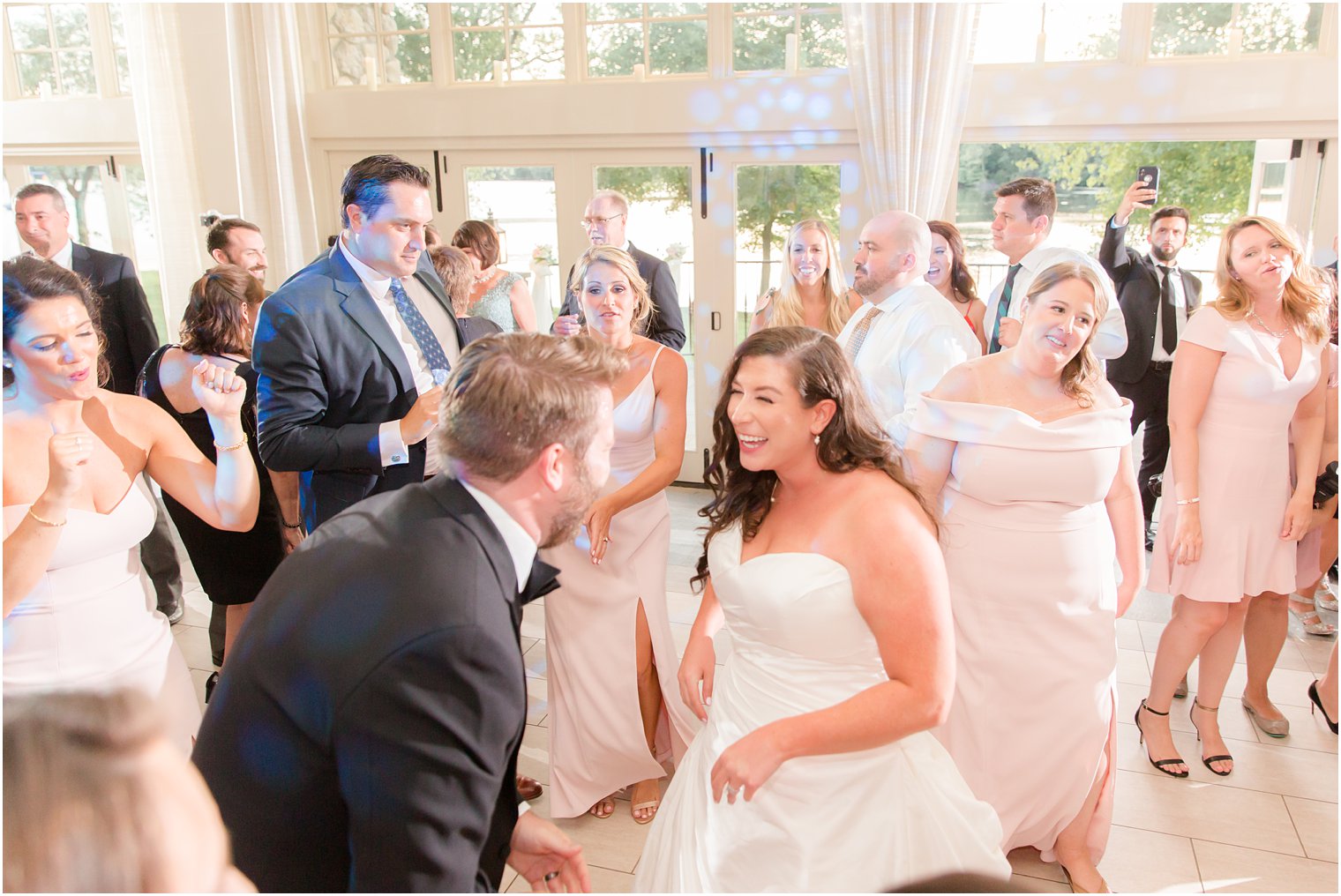 Guests dancing at wedding reception at Indian Trail Club 