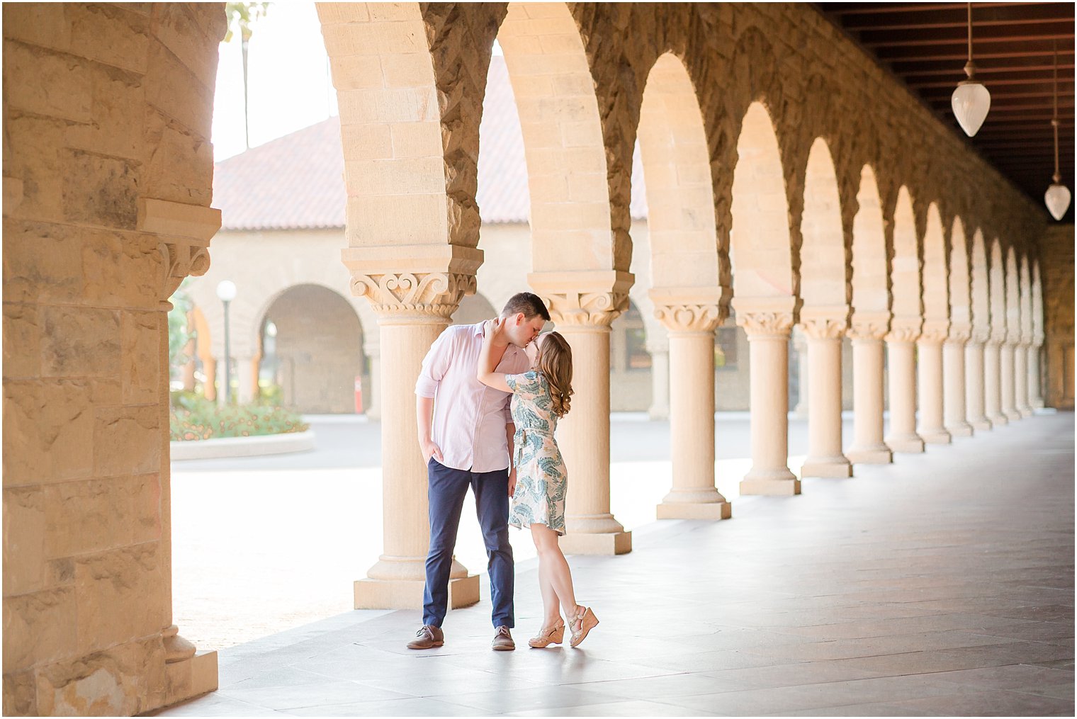 Engagement photos in hallway at Stanford University