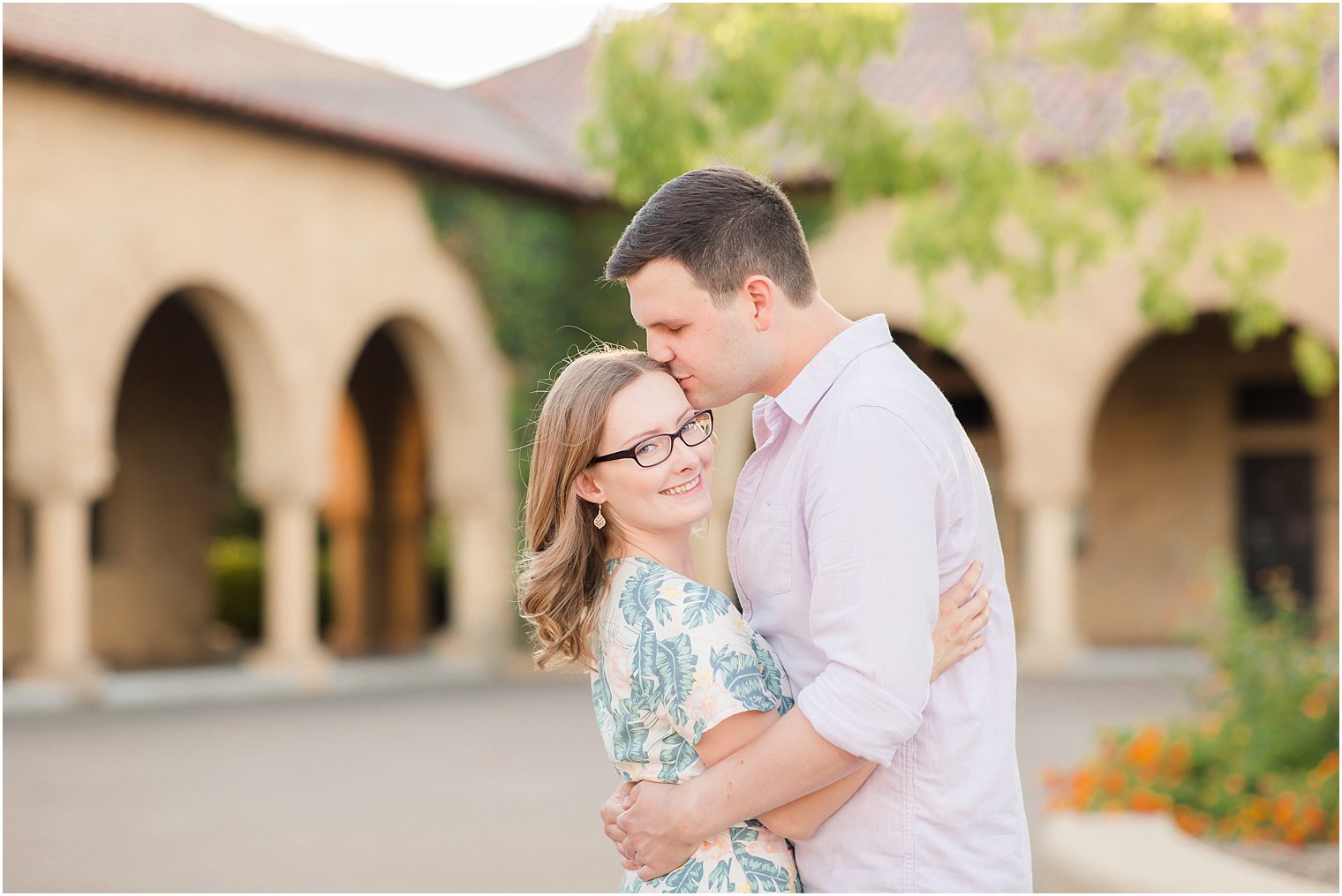 Engagement photos in courtyard at Stanford University
