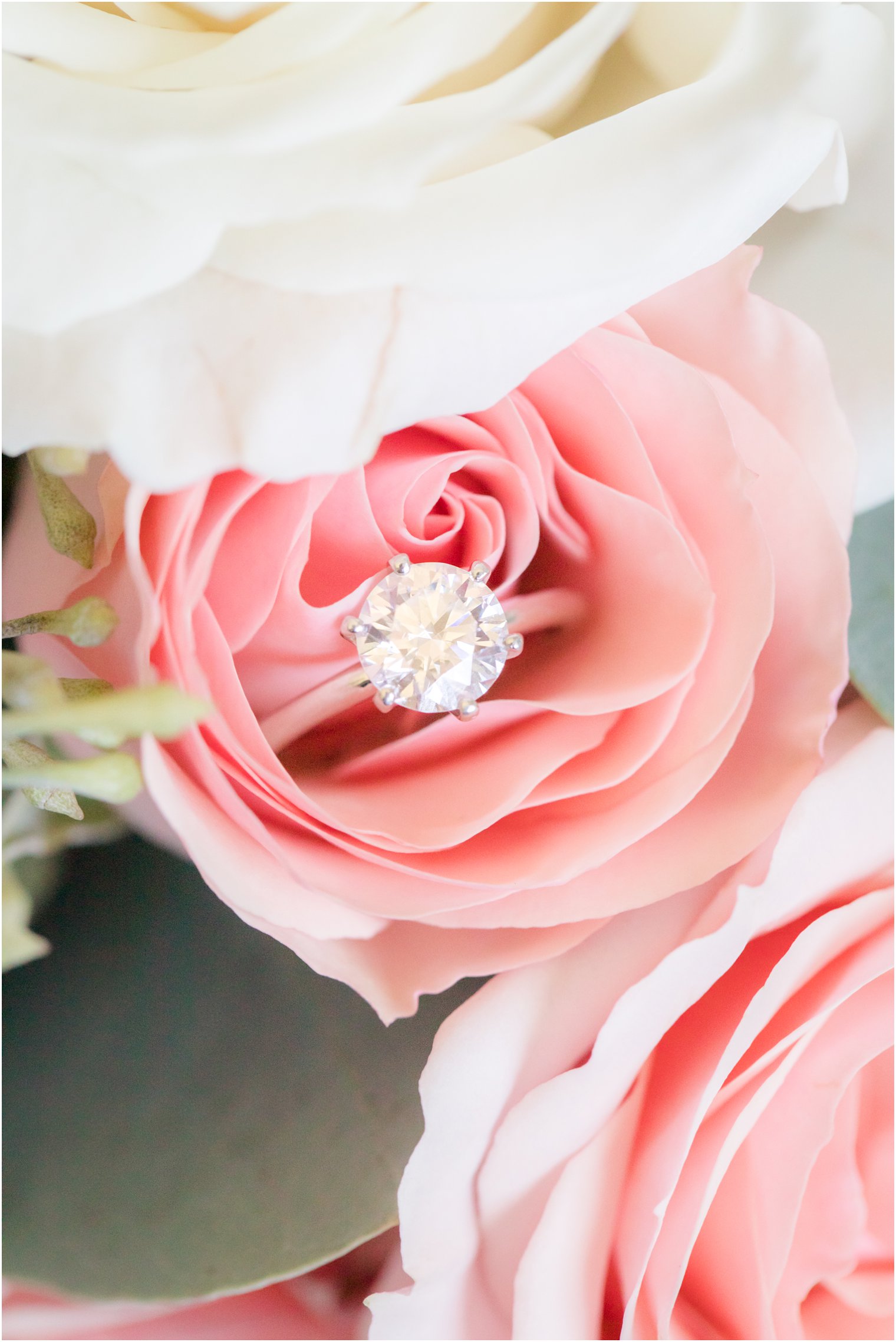 Engagement ring in bouquet by Kirk Florist