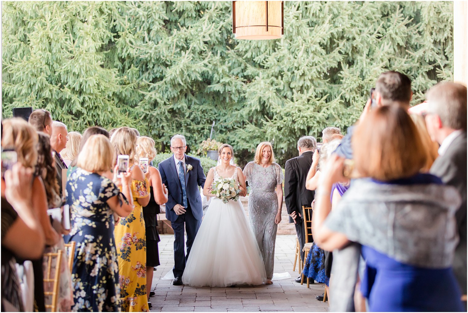 Bride walking down the aisle | Wedding ceremony at Stone House at Stirling Ridge Wedding Photos by NJ Wedding Photographers Idalia Photography