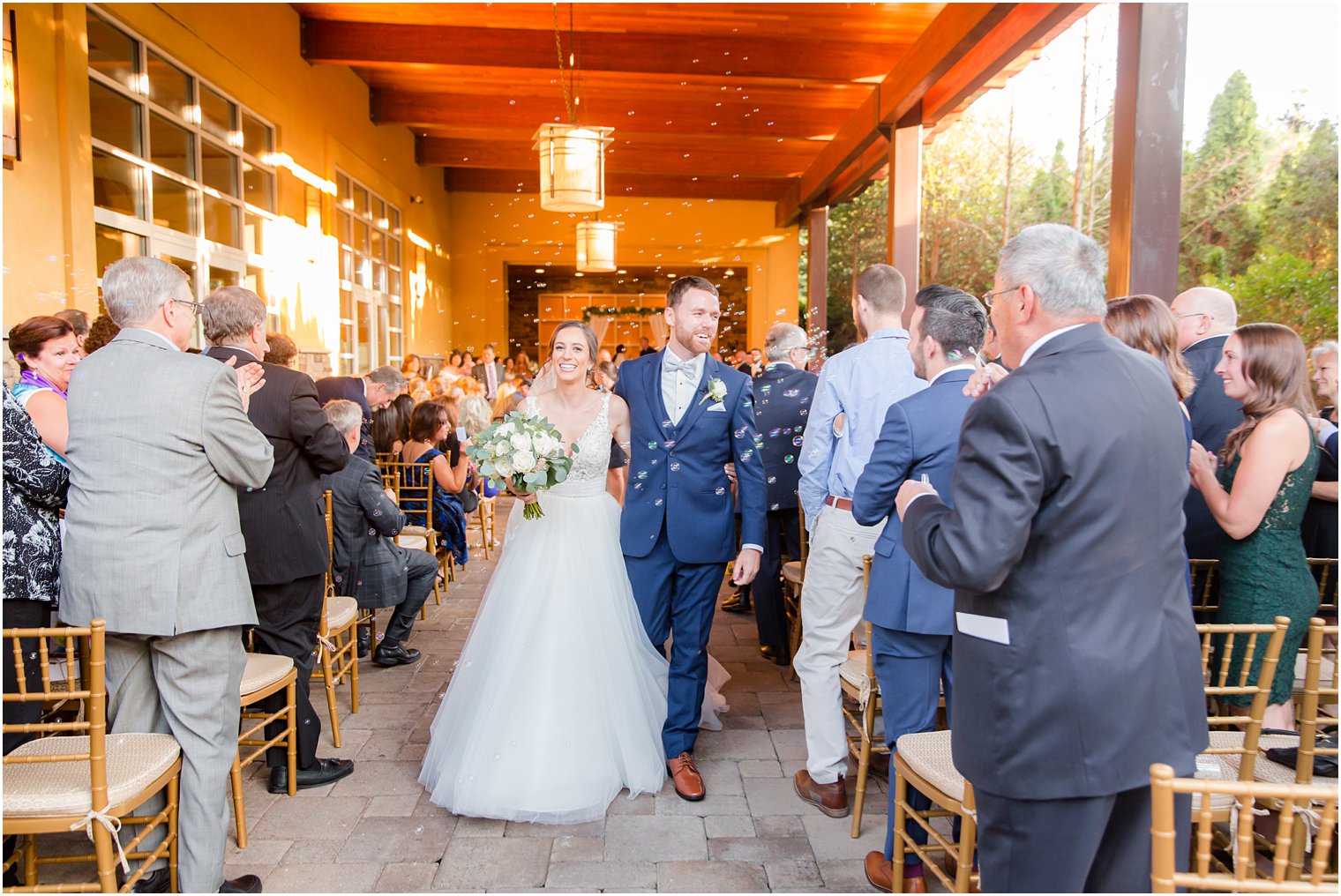 Recessional during wedding ceremony at Stone House at Stirling Ridge Wedding Photos by NJ Wedding Photographers Idalia Photography