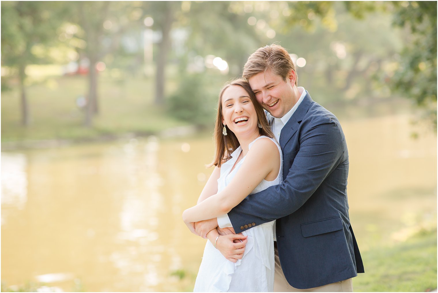 Natural laughter from engaged couple during Summer Engagement in Spring Lake, NJ