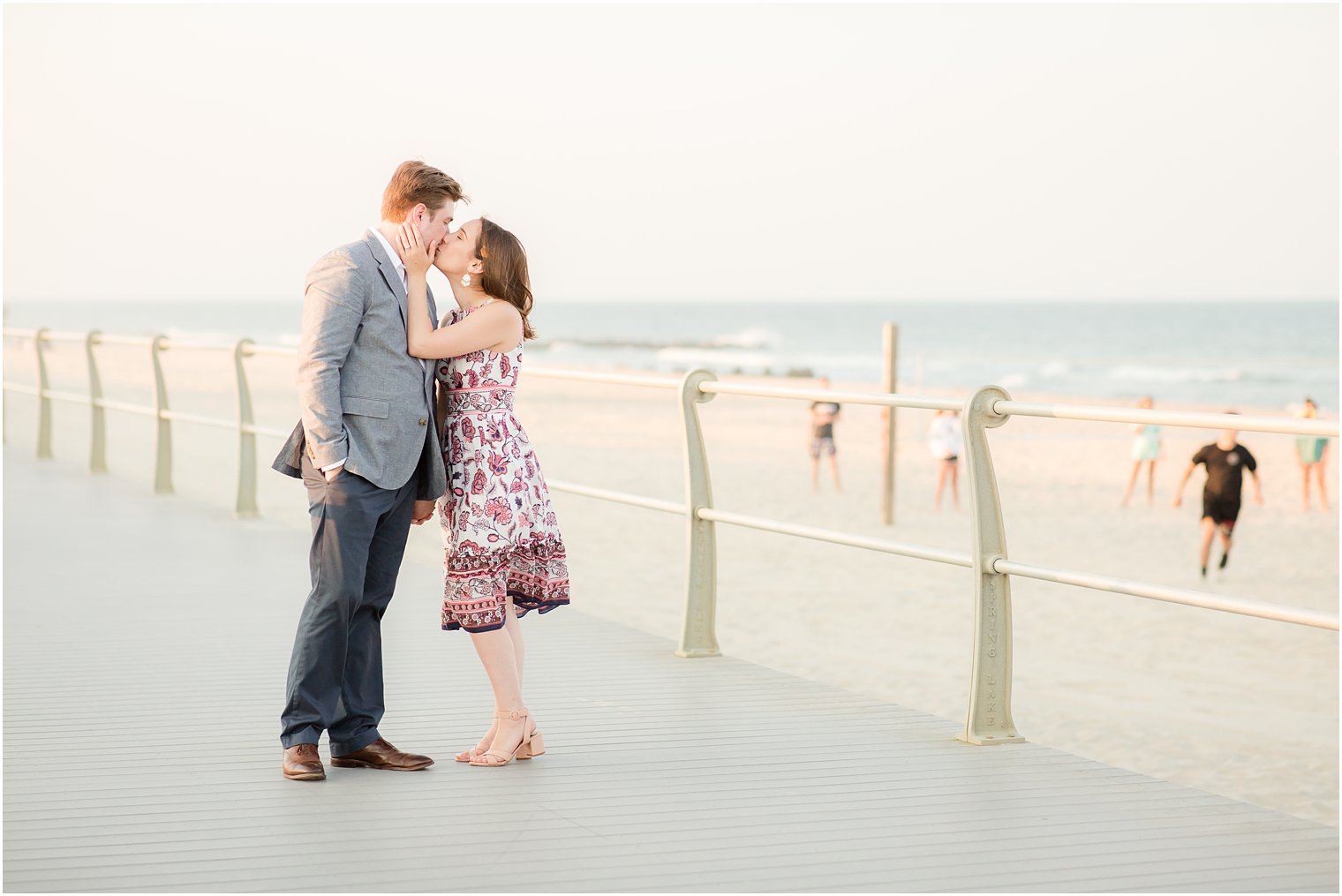 Engagement photo on boardwalk in Spring Lake NJ