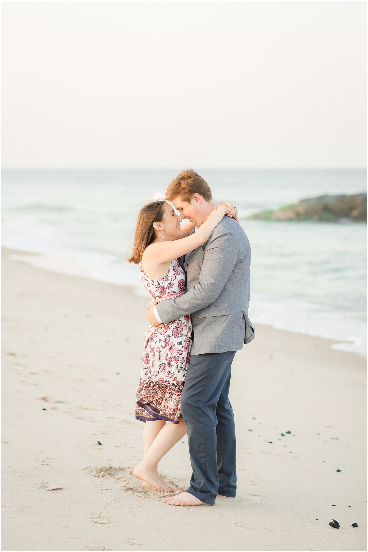 Romantic photo of bride and groom on the beach