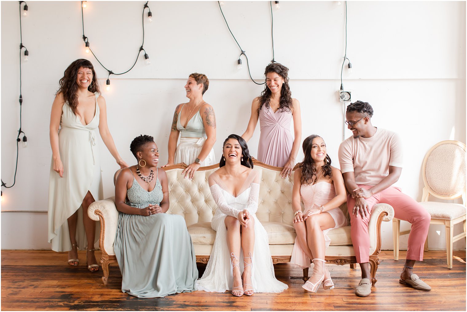 Bridal party wearing mismatched dresses