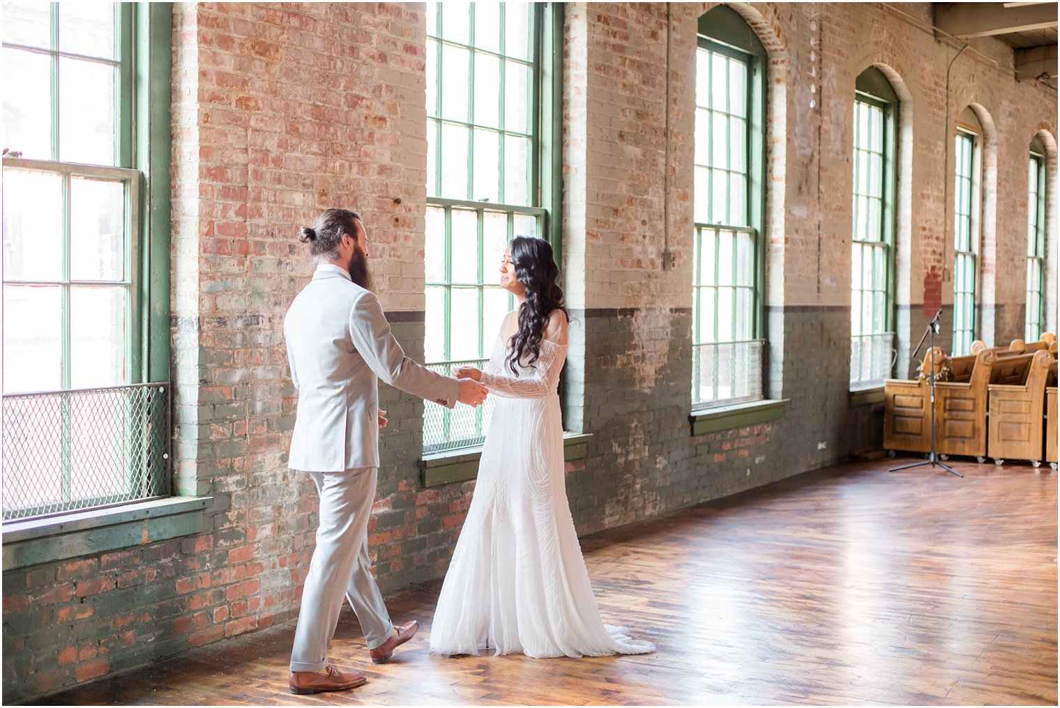 Bride and groom seeing each other for the first time on their wedding day