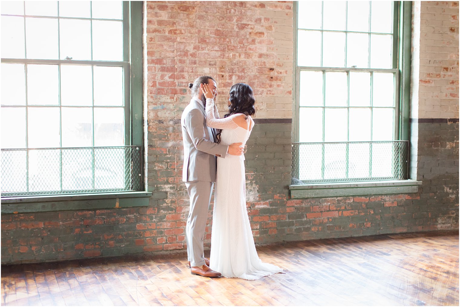 Groom crying during first look