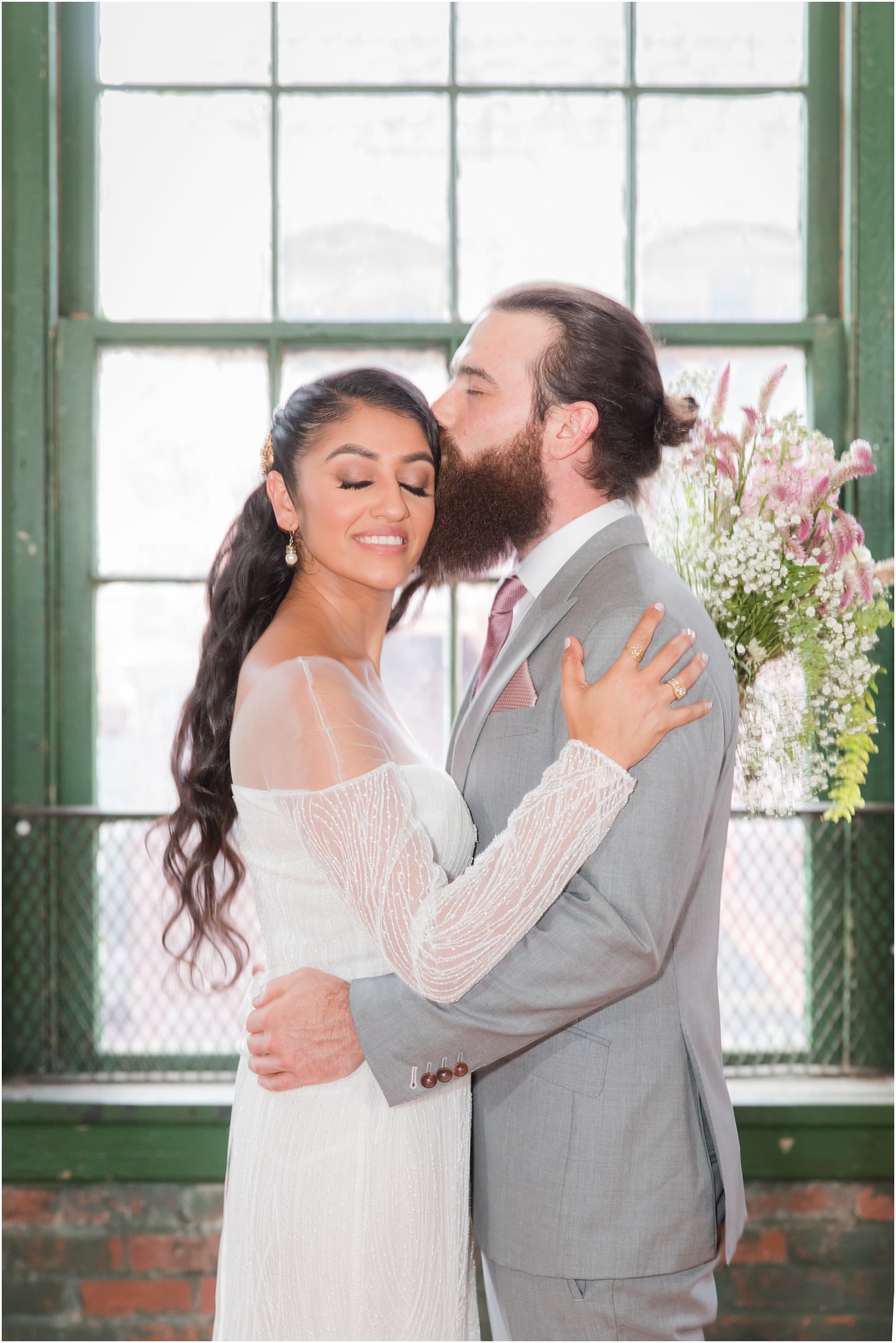 Quiet moment between bride and groom