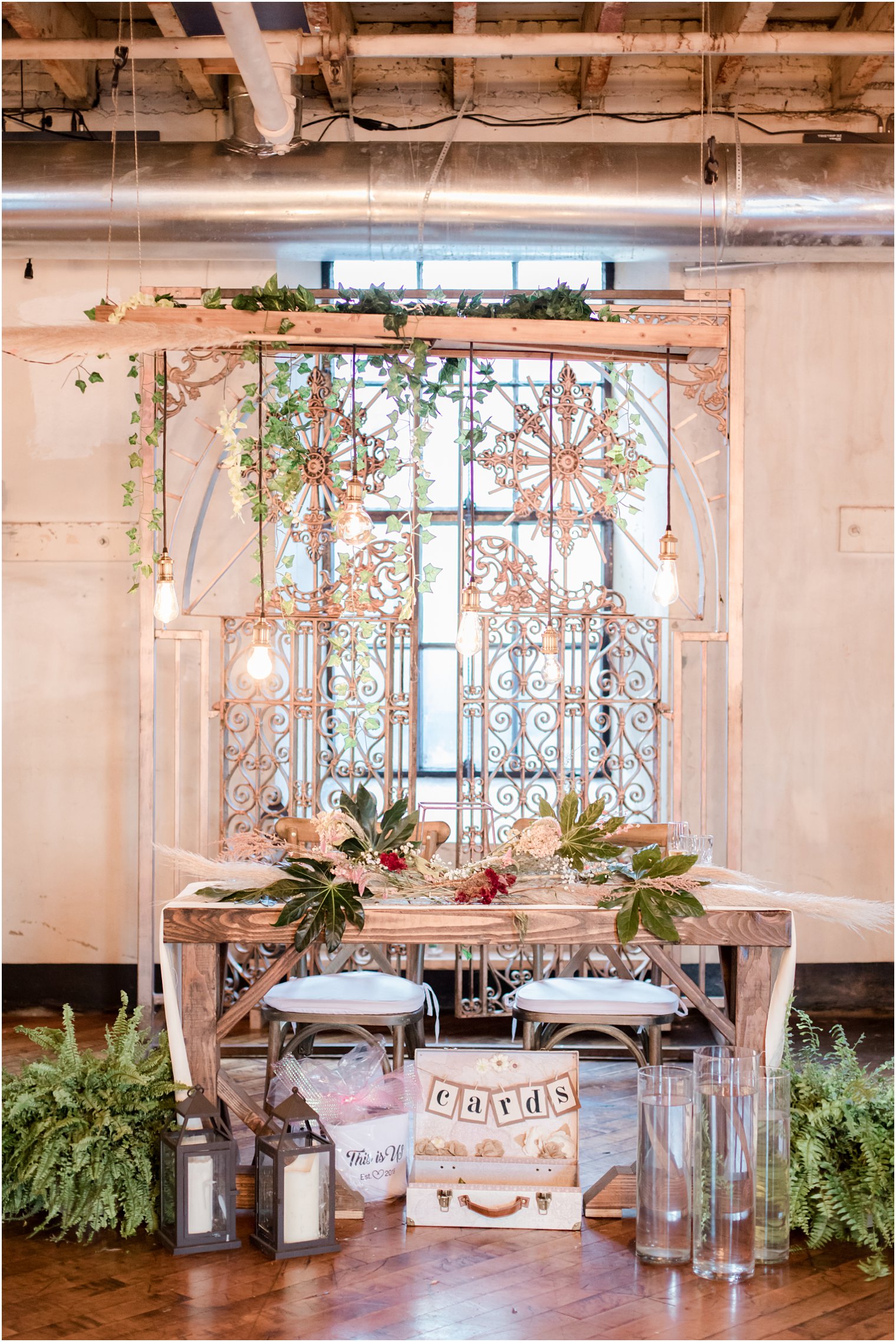 Sweetheart table reception decor for industrial chic wedding at Art Factory Studios in Paterson NJ