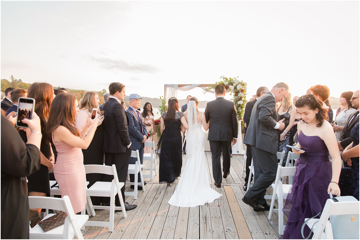 parents give bride away at Lake Mohawk Country Club wedding