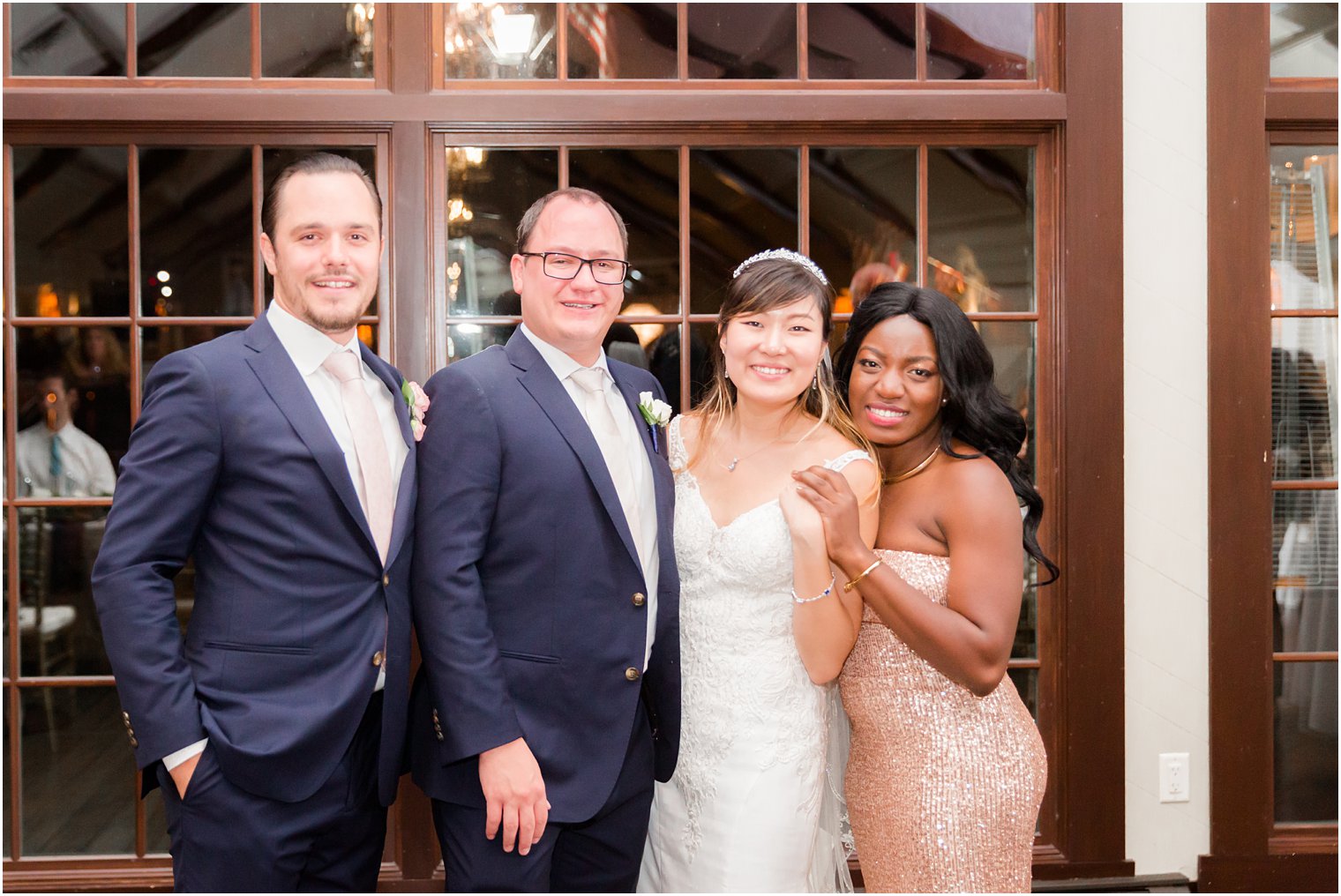 bride and groom with best man and maid of honor for Lake Mohawk Country Club wedding