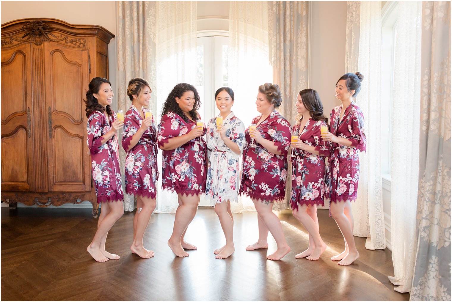 bridesmaids with mimosas prepare for wedding day in New Jersey