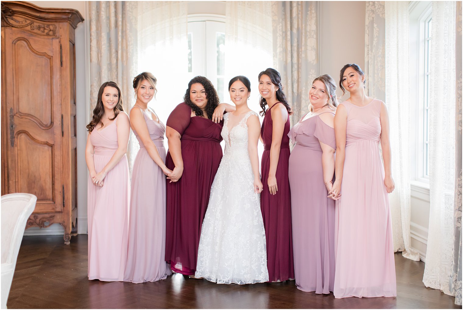 Bridesmaids wearing dresses by Birdy Grey