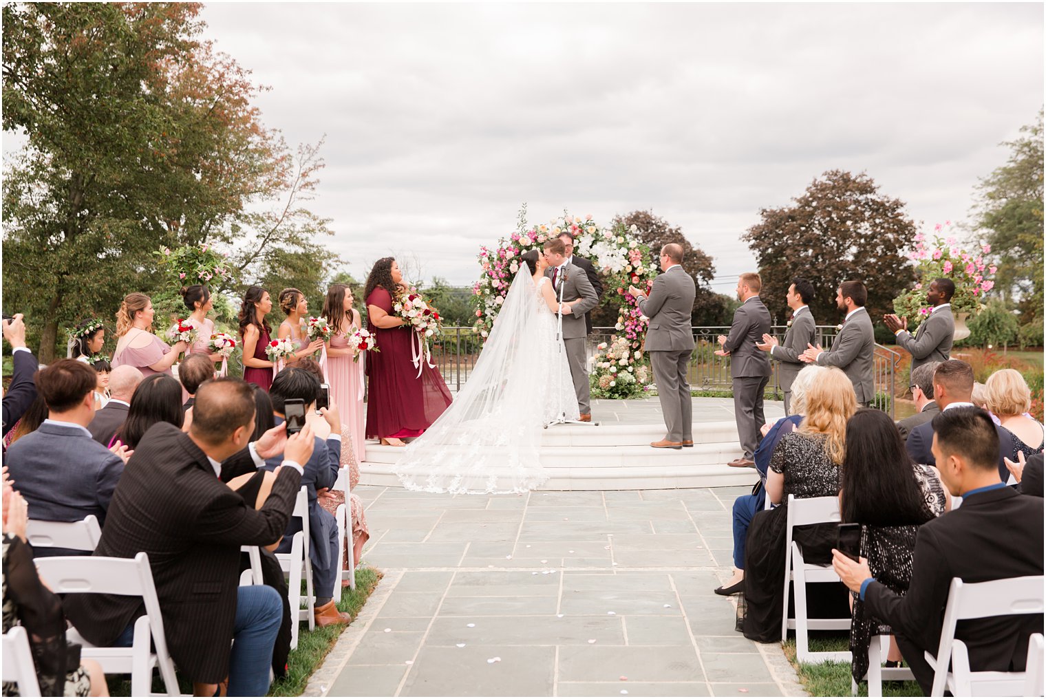 first kiss as husband and wife by Idalia Photography