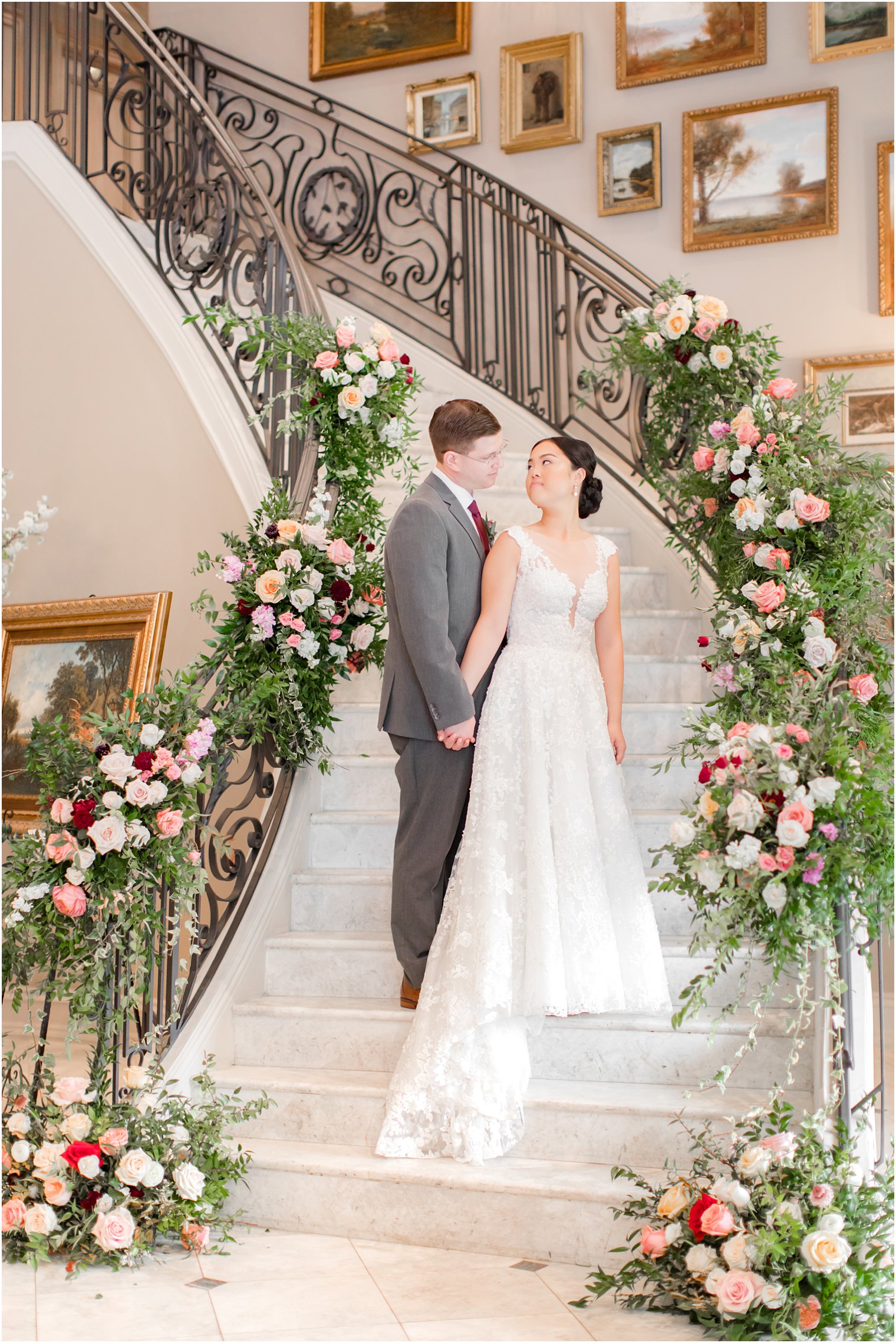 Wedding portraits on staircase at Park Chateau Estate