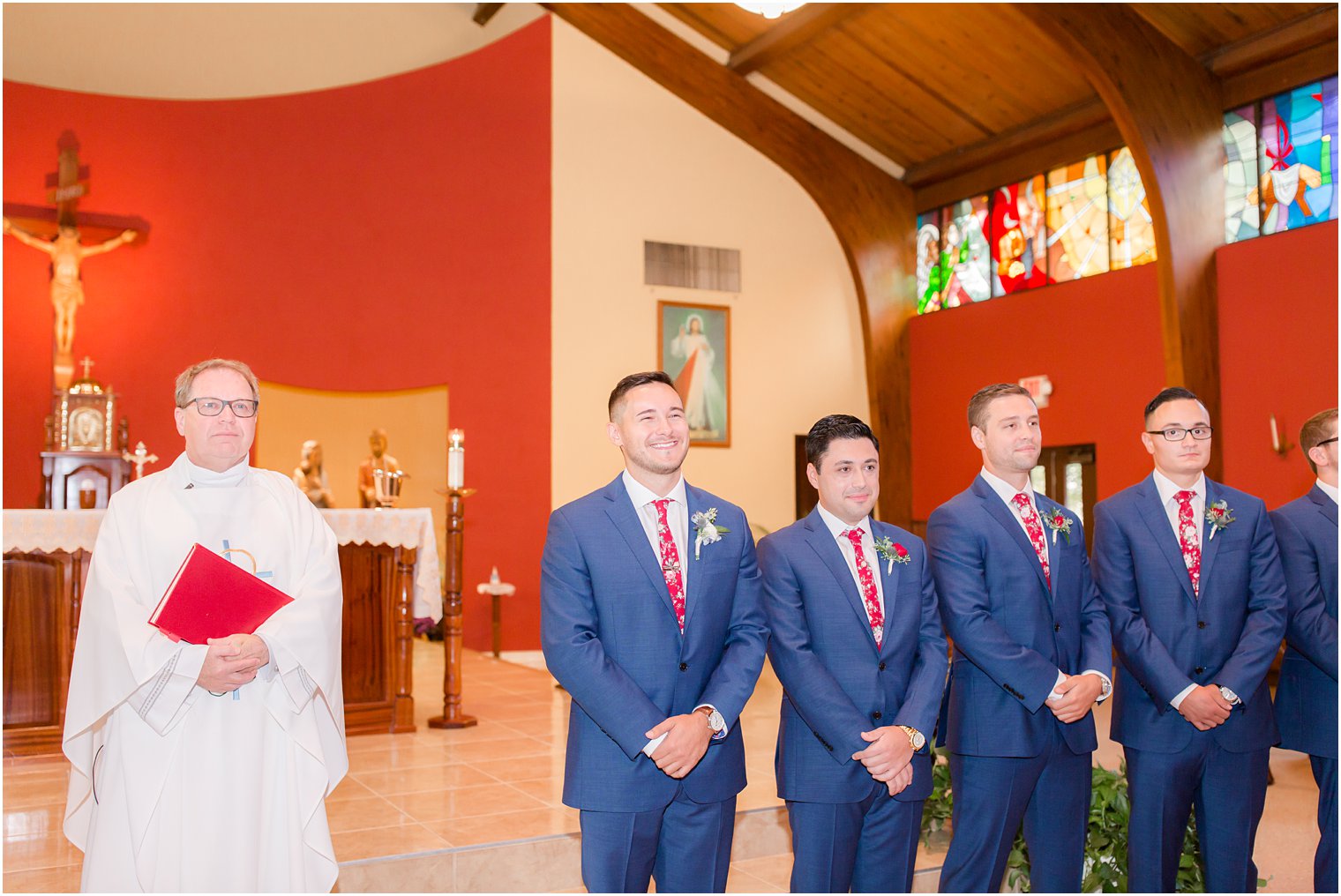 Groom seeing his bride for the first time at St. Veronica's Church in Howell 