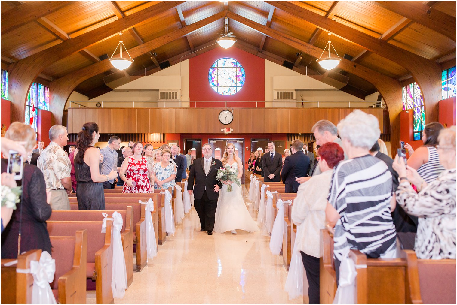 Bride walking down the aisle at St. Veronica's Church