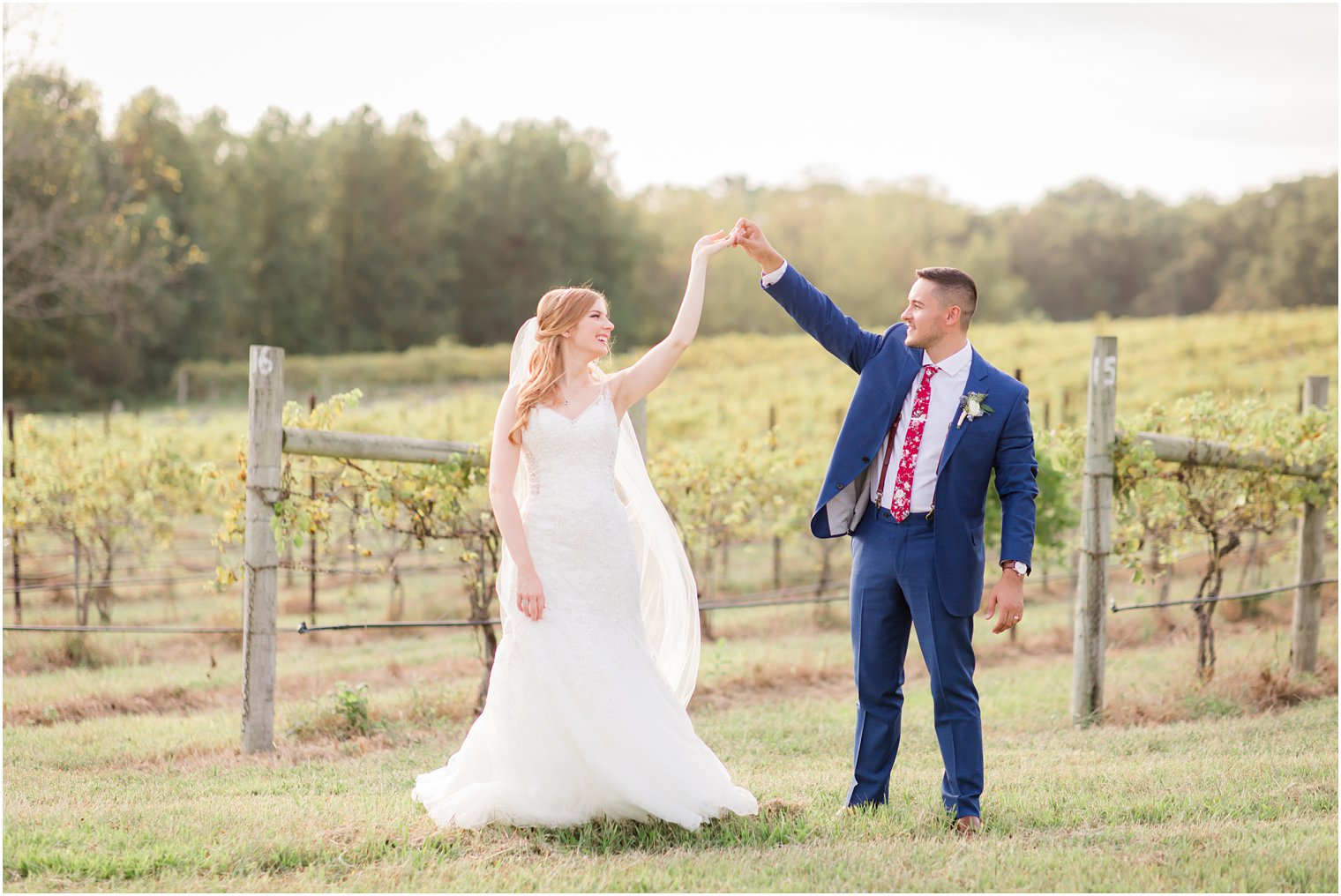 Groom twirling his bride at Laurita Winery