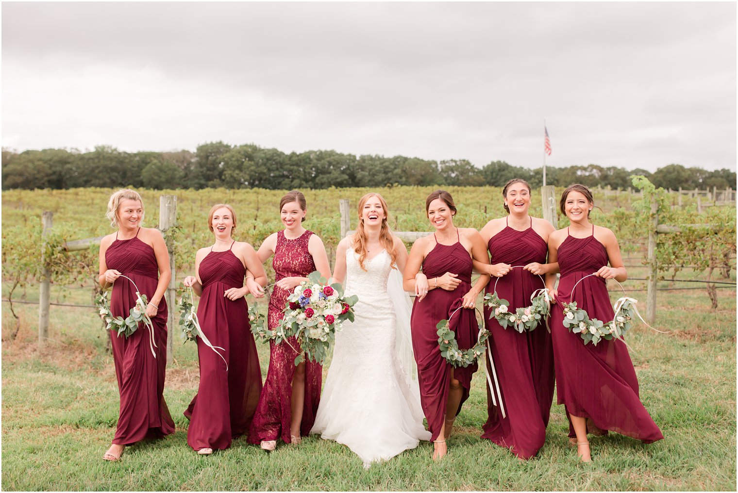 Candid bridesmaids photo in a vineyard