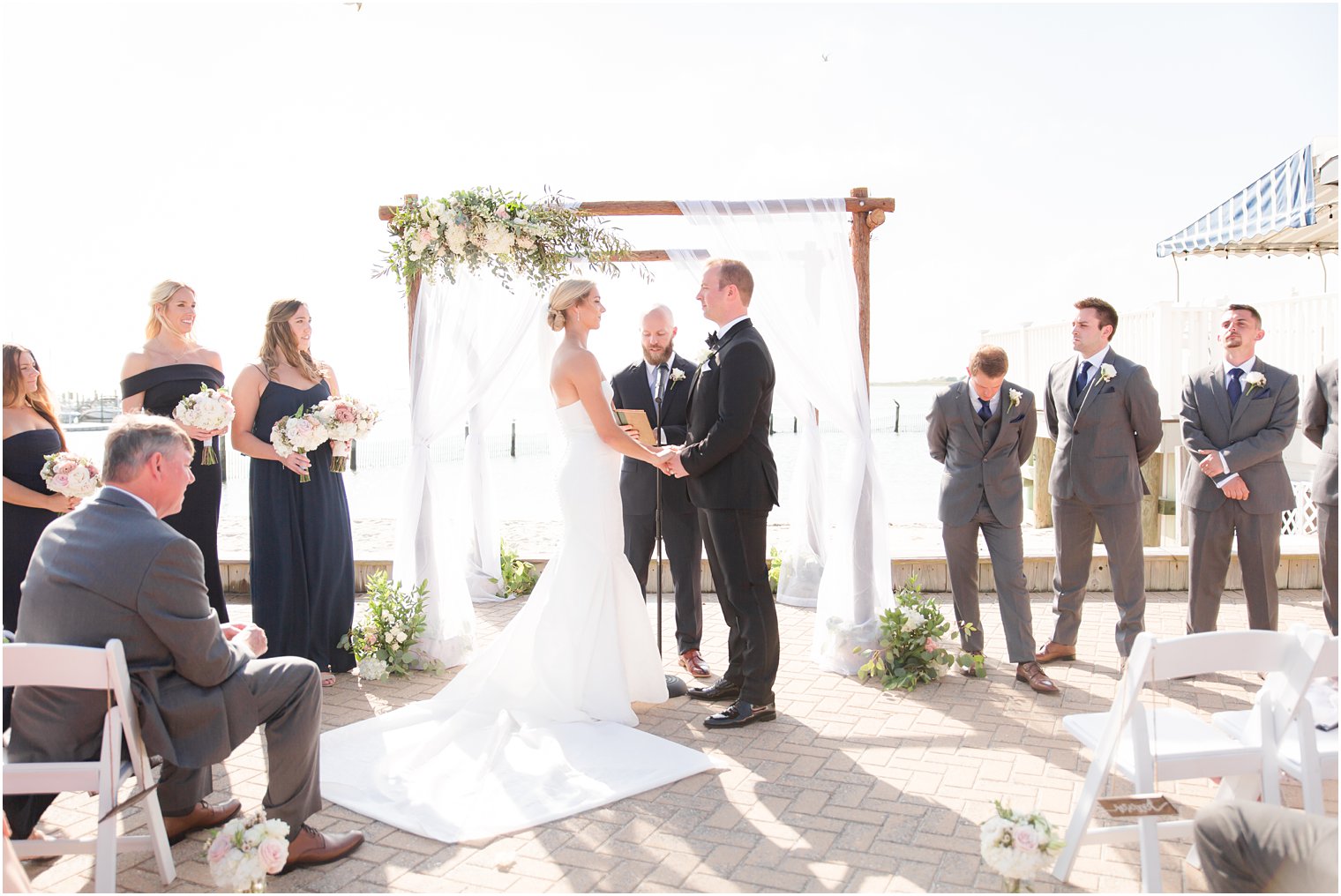 Outdoor wedding ceremony at Brant Beach Yacht Club