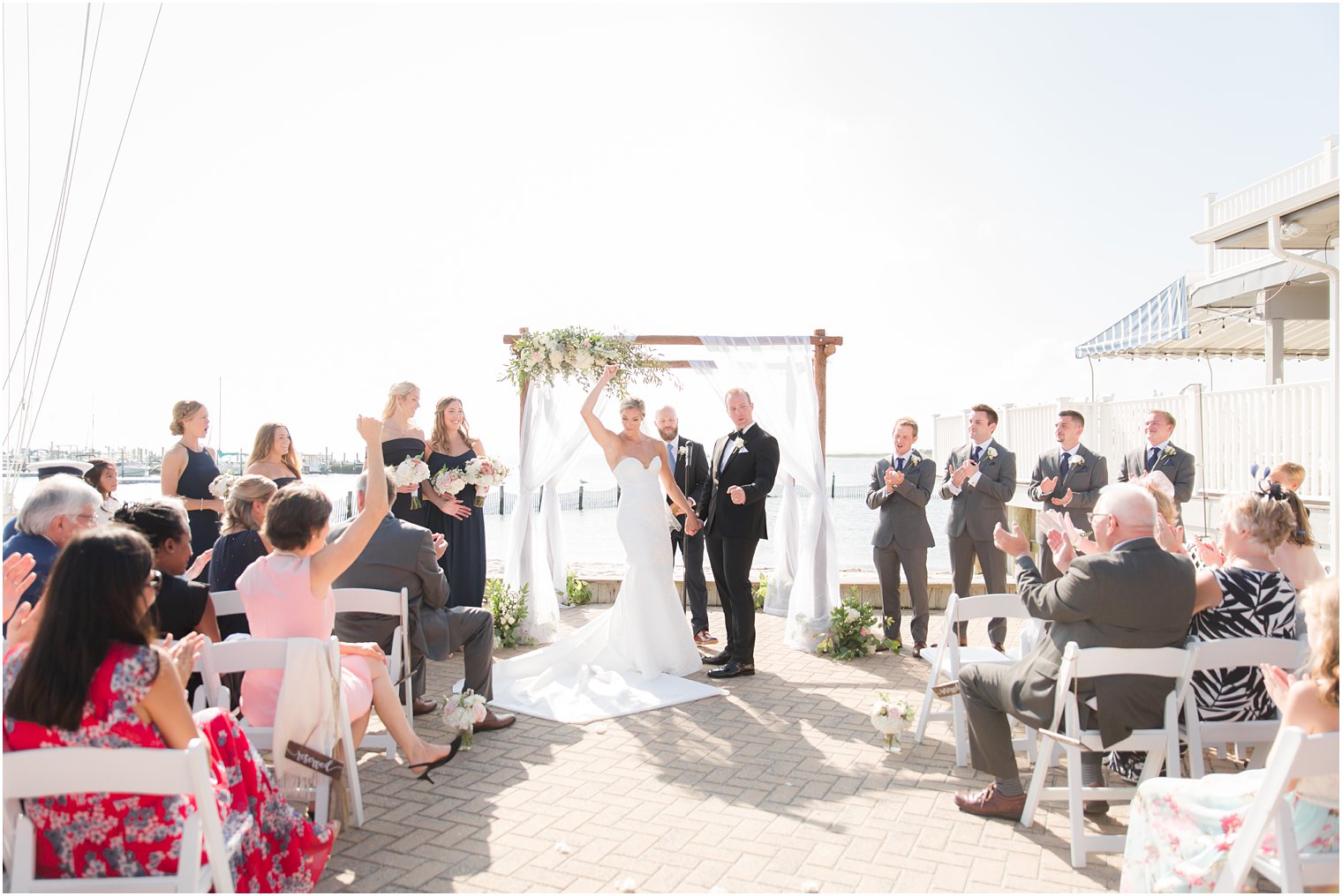 Outdoor wedding ceremony at Brant Beach Yacht Club