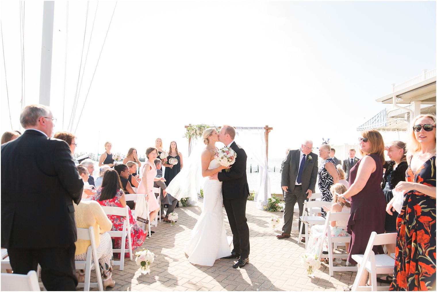 Outdoor wedding ceremony at Brant Beach Yacht Club