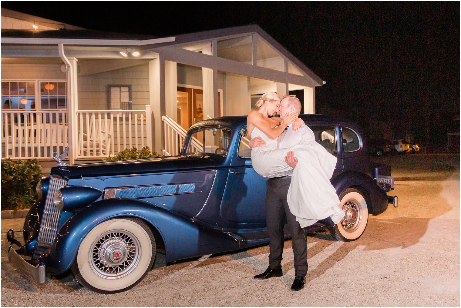 bride and groom with getaway car