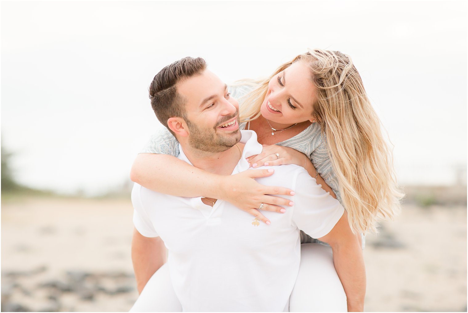 joyful engagement photos on LBI with Idalia Photography