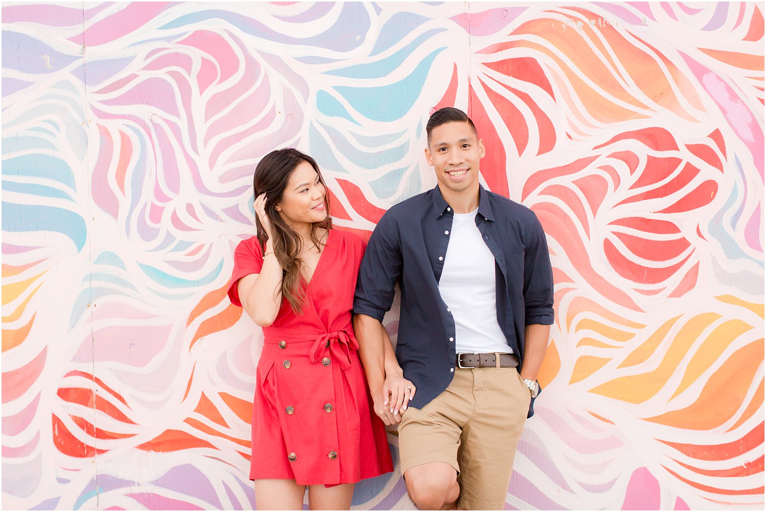 engagement session by mural in Asbury Park with Idalia Photography