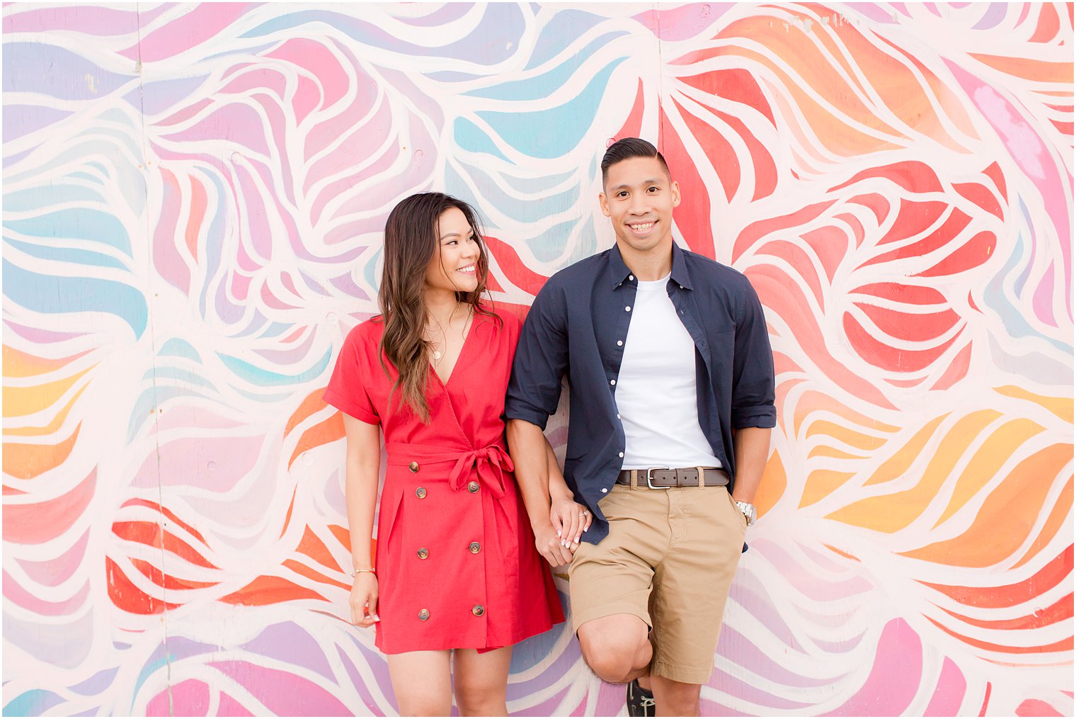 engagement session in Asbury Park on boardwalk with Idalia Photography