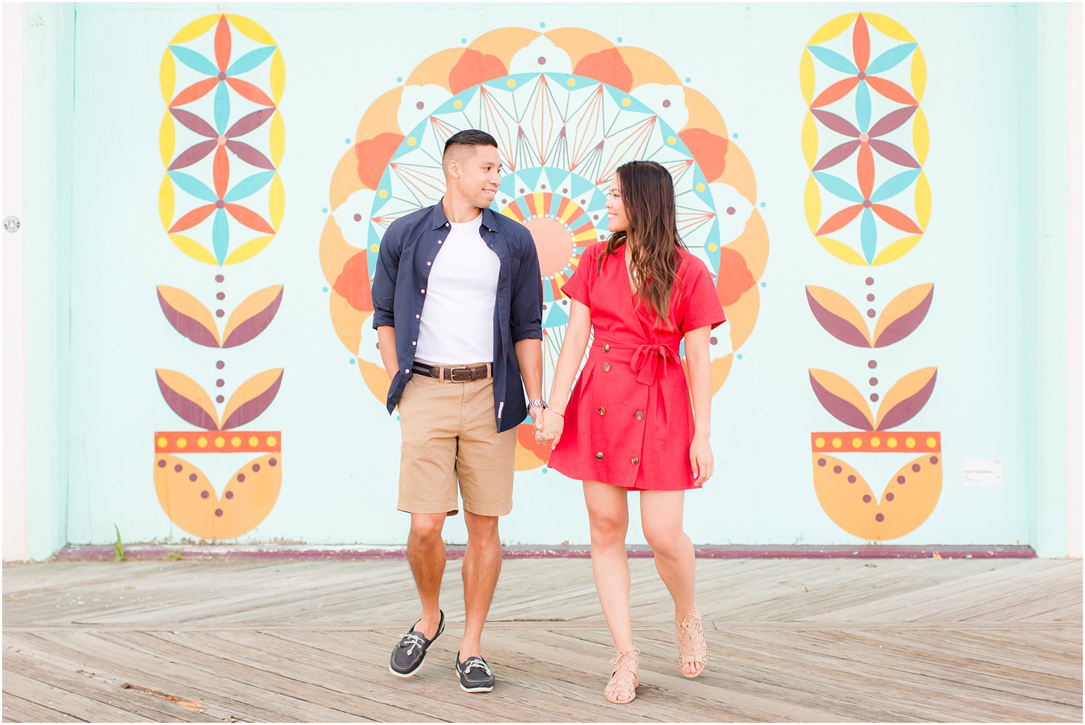 engaged couple photographed in Asbury Park with Idalia Photography