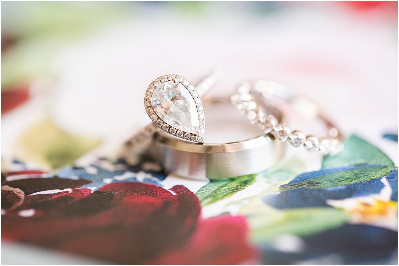 jewelry on wedding invitation photographed by Idalia Photography