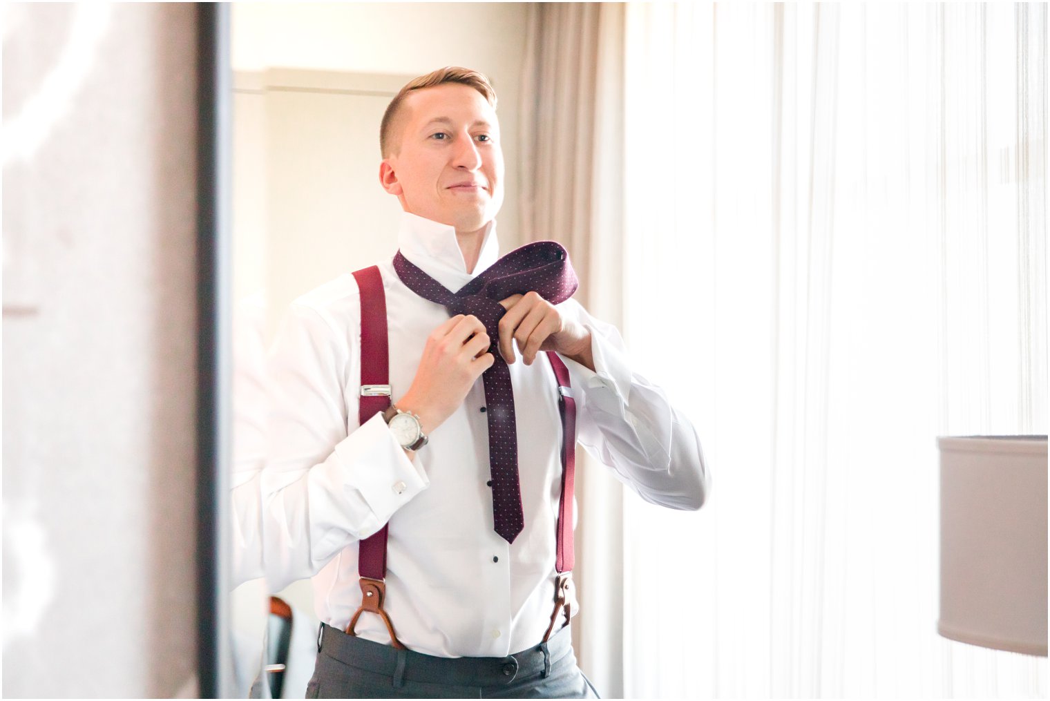 Idalia Photography captures groom preparing for Stone House at Stirling Ridge wedding