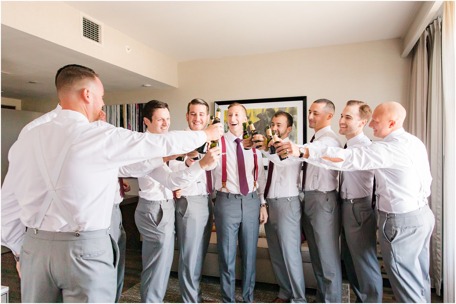 groomsmen cheer for Stone House at Stirling Ridge wedding