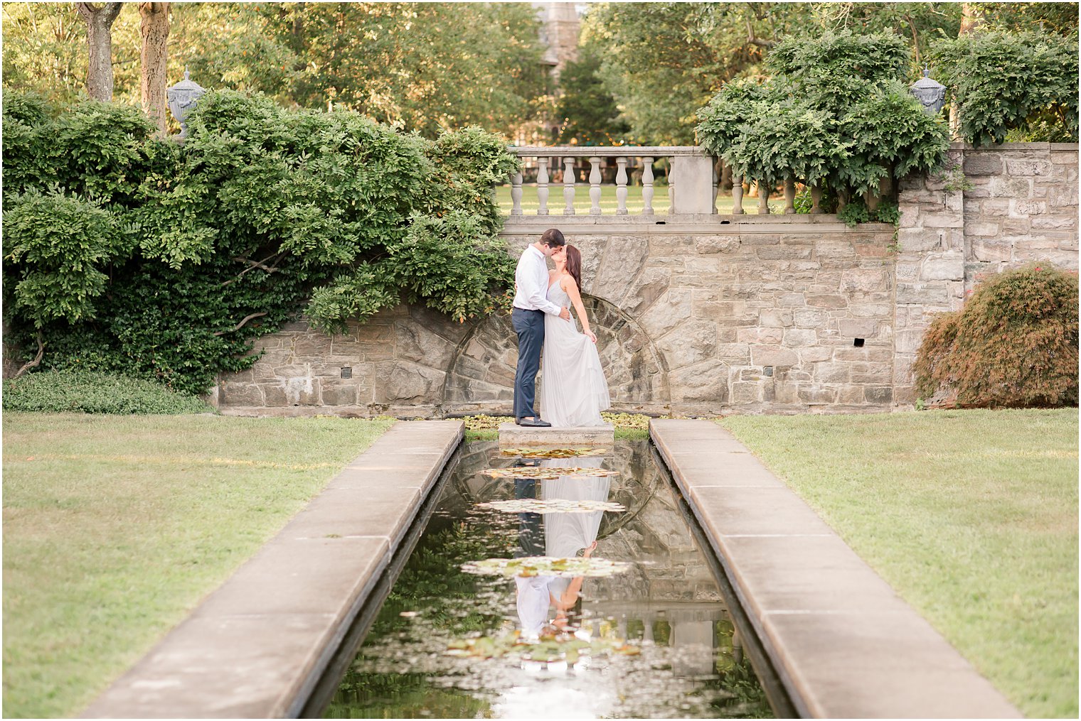 Idalia Photography captures classic engagement session by pond at Skylands Manor
