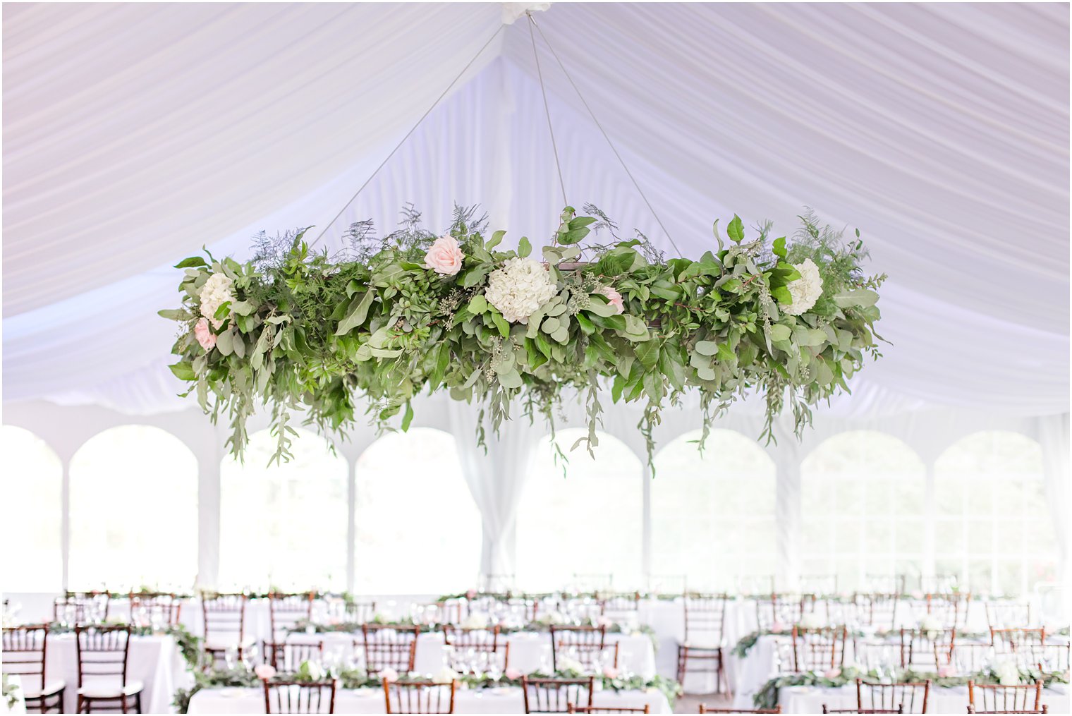 Windows on the Water at Frogbridge wedding reception hanging floral display by Bespoke Florals