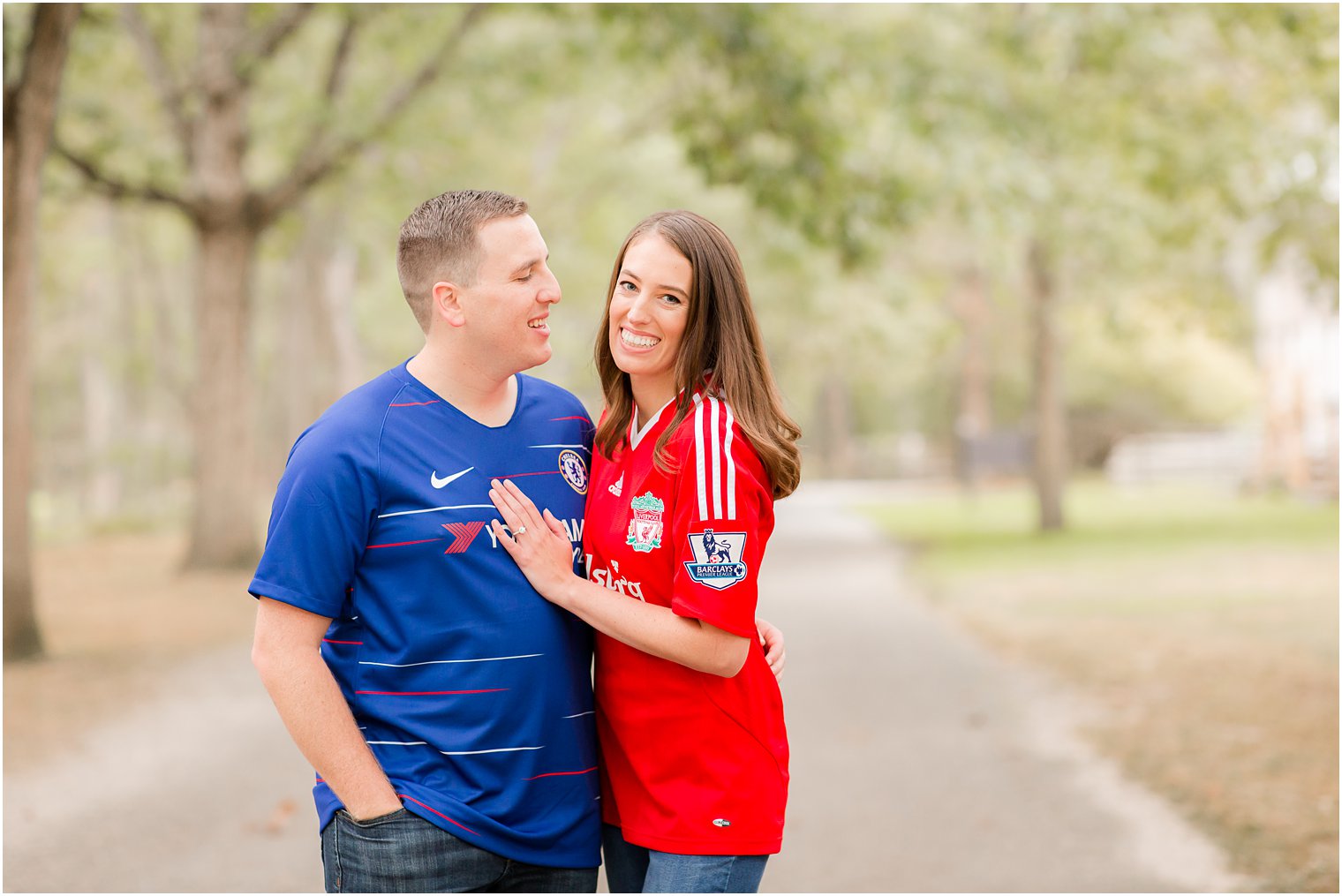 engagement photos in sports jerseys with Idalia Photography