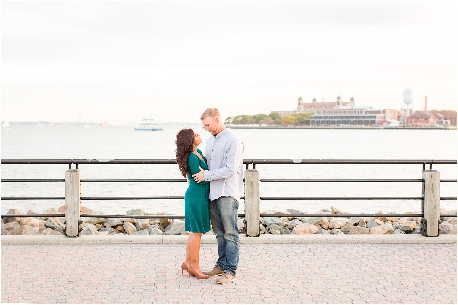 Engagement photo with Ellis Island in the background