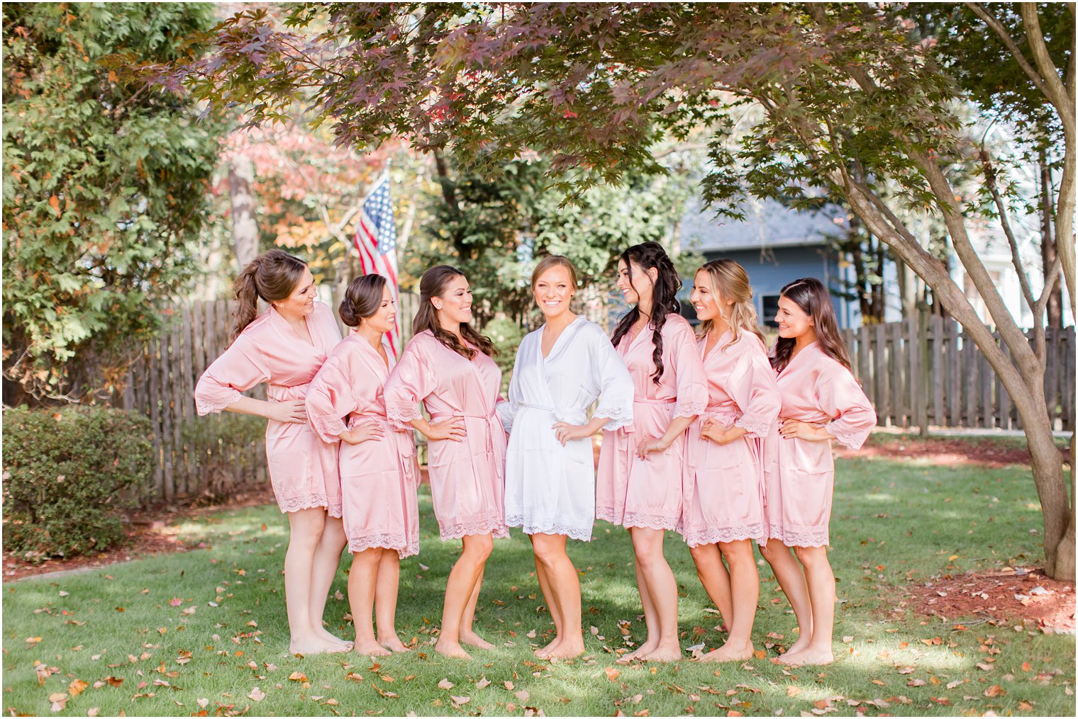 bride and bridesmaids prepare for fall wedding