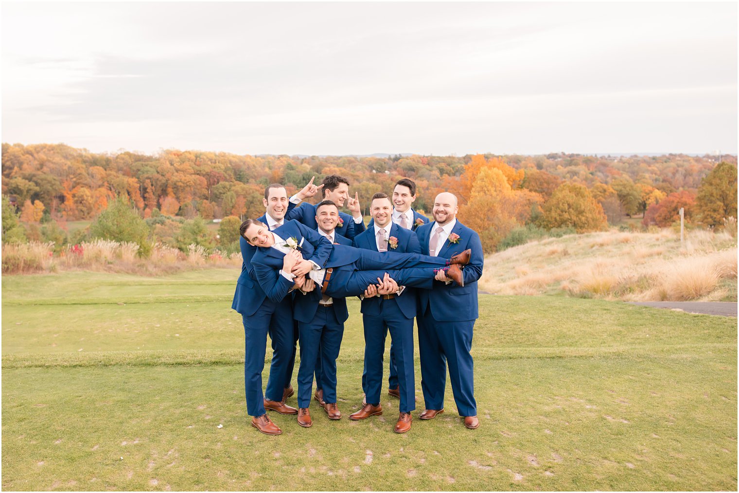 playful groomsmen portraits with Idalia Photography